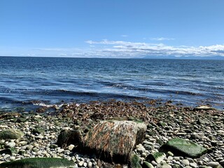 Rocky coast of the sea and blue sky