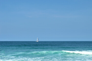 Sailboat on the sea sailing and clear blue sky