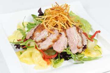 grilled pork with salad