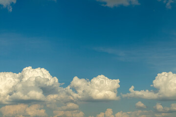 Beautiful white clouds on a blue sky background