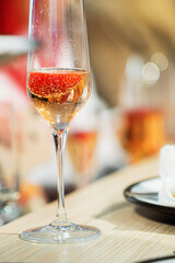 catering table with fizz and strawberries