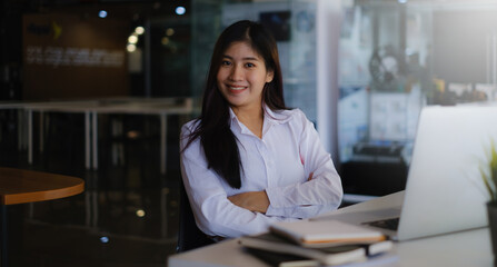 Online class. Happy asian female using laptop for online learning at home.