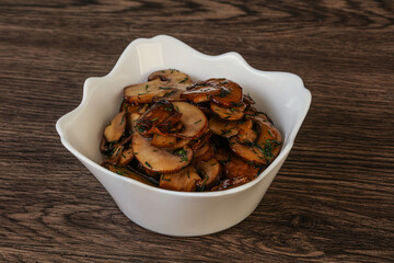 Roasted champignon with herbs and spices