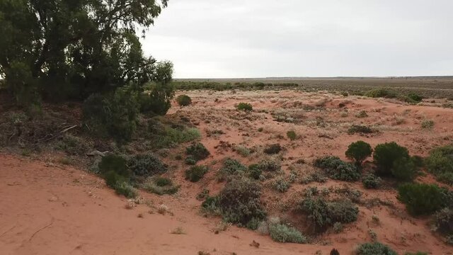 Outdoor nature drone aerial sand hills move forward desert australia bush outback