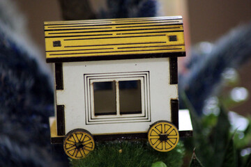 Colorful wheelhouse in the artificial garden © aykutaktas