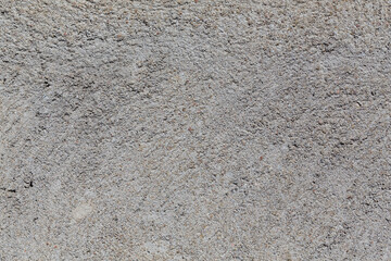 Crushed granite stones wall - close up