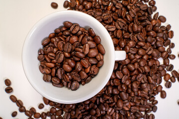 a cup of coffee, coffee beans