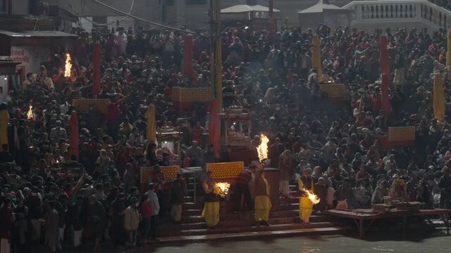 Ganga Arti, worship of Ganges river, Haridwar Uttarakhand India, saints lighting candles. Appleprores 422 60fps Cinetone. High quality 4k footage