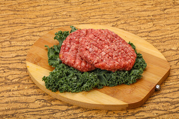 Raw beef burger cutlet for cooking