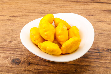 Marinated patissons in the bowl
