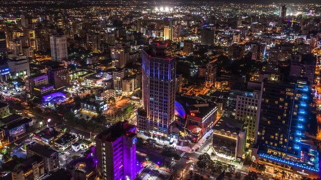 Night air hyperlapse in the city center full of lights and vehicles in Santo Domingo, Dominican Republic