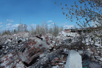 Construction debris on the background of new buildings in the city.The concept of environmental pollution.A copy of the space.Photos without people.