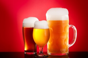 Golden beer in glass with foam, alcohol beverage,  lager yellow.