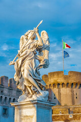 Obraz premium statue of an angel standing on the bridge leading to the Castle Sant'Angelo, Rome