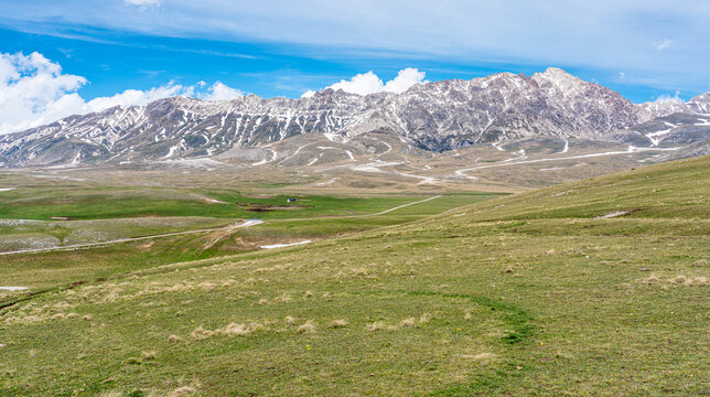 Panoramic view of Campo Imperatore and the Gran Sasso massif in the Gran Sasso National Park. Abruzzo, Italy.