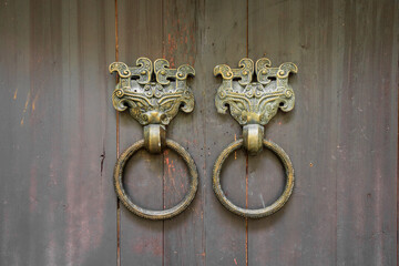 Metal animal head door ring