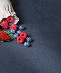 Berries on a slate background
