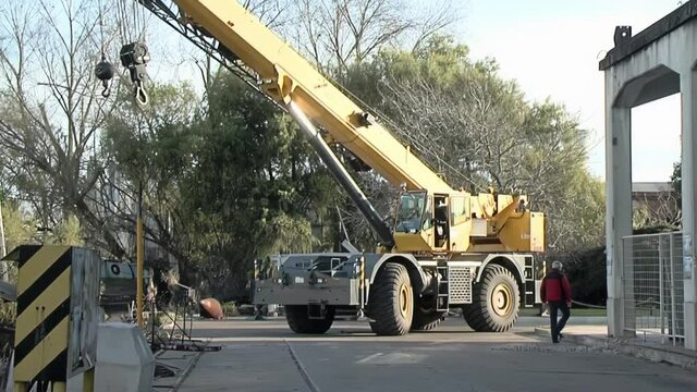Yellow Mobile Crane Moving Inside Port Area, Buenos Aires, Argentina 