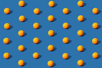 Orange fruit pattern on blue background.