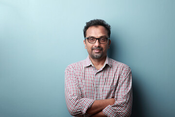 Obraz premium Portrait of a happy man of Indian origin