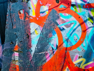 Closeup of colorful messy painted urban wall texture. Modern pattern for wallpaper design. Creative...
