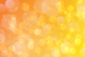 A festive abstract delicate golden yellow orange gradient background texture with glitter defocused sparkle bokeh circles. Card concept for Happy New Year, party invitation, valentine or other holiday