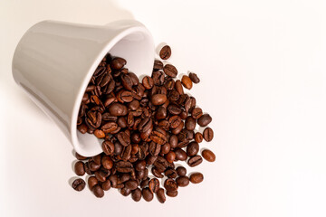 a cup of coffee, coffee beans