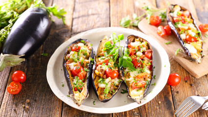 baked stuffed aubergine with vegetable and mozzarella