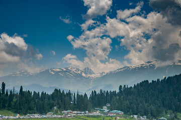 Gulmarg is a town, a hill station in summer time, a popular skiing destination of the Indian state of Jammu & Kashmir. It is a popular tourist destination and hill station