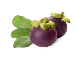 Delicious ripe mangosteens and green leaves on white background