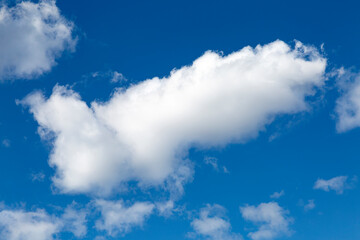 Fototapeta premium Blue sky with cumulus white clouds as nature background