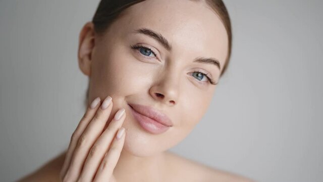 Healthy skin woman face close up beauty eyes lips fresh skin natural make up