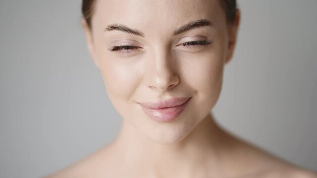 Beautiful woman close up face healthy skin beauty concept cosmetic clean healthy natural make up fresh skin beauty young model