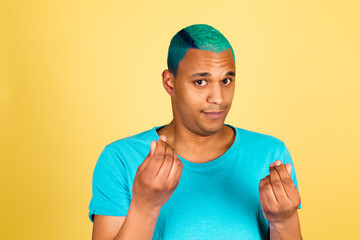 Fototapeta premium Black african man in casual on yellow background asking for money