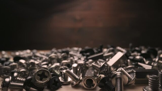 Piles of computer screws on a table