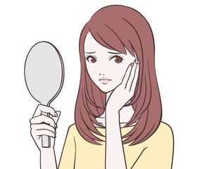 手鏡を持つ女性