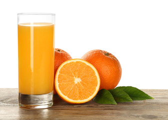 Delicious orange juice and fresh fruits on wooden table against white background. Space for text