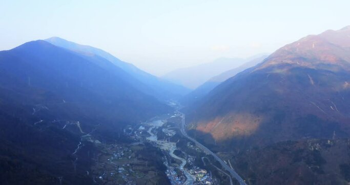 China`s rapid infrastructure development. Buidling highways across mountains and valleys