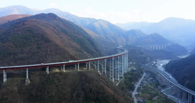 China`s rapid infrastructure development. Buidling highways across mountains and valleys