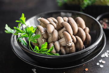 fresh oyster mushroom raw mushrooms meal snack diet vegan or vegetarian food copy space food background rustic. top view 