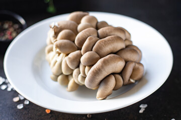 fresh oyster mushroom raw mushrooms meal snack diet vegan or vegetarian food copy space food background rustic. top view 