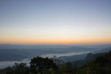 Dawn of Sea Fog on the top of the Sierra Early morning at Doi Samer Dao, Nan, thailand