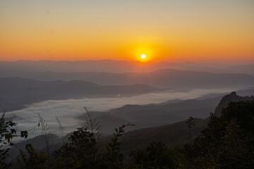 Dawn of Sea Fog on the top of the Sierra Early morning at Doi Samer Dao, Nan, thailand