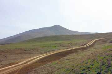 Beautiful silhouettes of mountains in the fog.