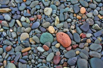 Beautiful differently colored rocks on the shore of Maine.