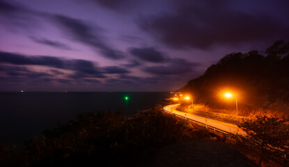 Winding road of Chaloem Burapha Chonlathit Road at night view from Noen Nang Phaya Viewpoint . The location in Na Yai Am, Chanthaburi, Thailand.
