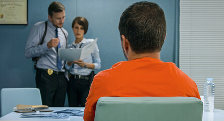Close up back and neck criminal, detectives to discuss his case and pictures.