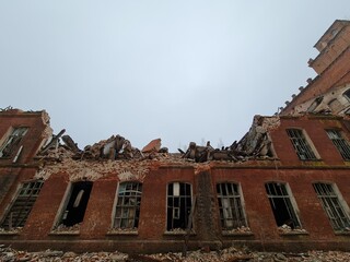 An old destroyed factory. Ruined brick factory.