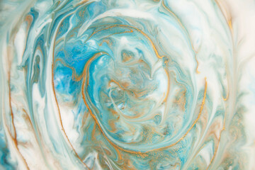 Abstract painting with epoxy resin. Marble swirls of blue, white, and gold. Abstract Modern Veined Liquid Background
