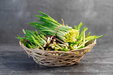 Fresh wild garlic, KOLBA, or Bear onion, Wild garlic in a bowl. Healthy food wild garlic wild garlic or bear garlic
